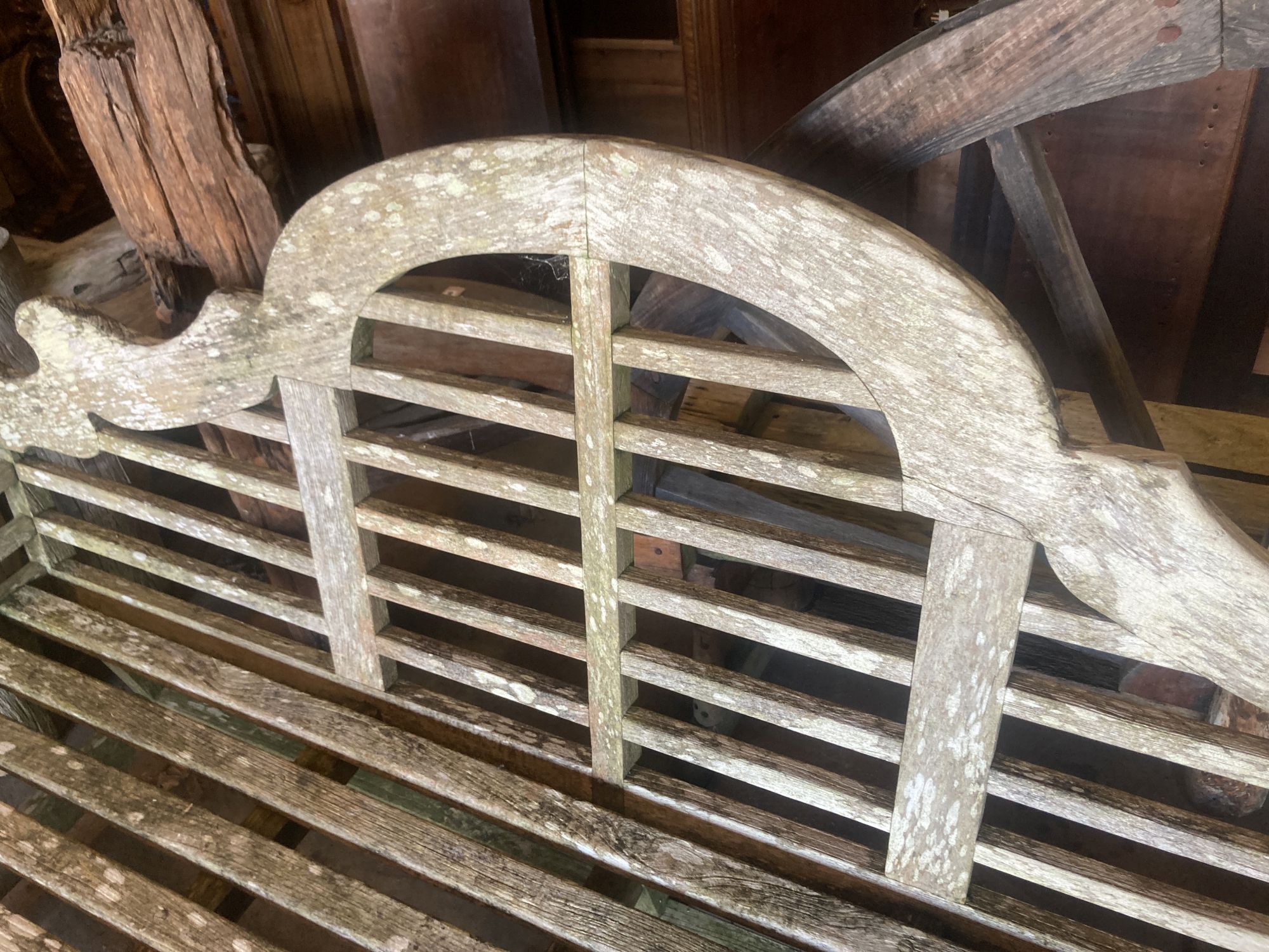 A vintage Lutyens design weathered teak garden bench, width 196cm depth 50cm height 106cm